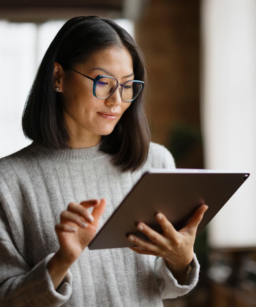 Woman holding a tablet